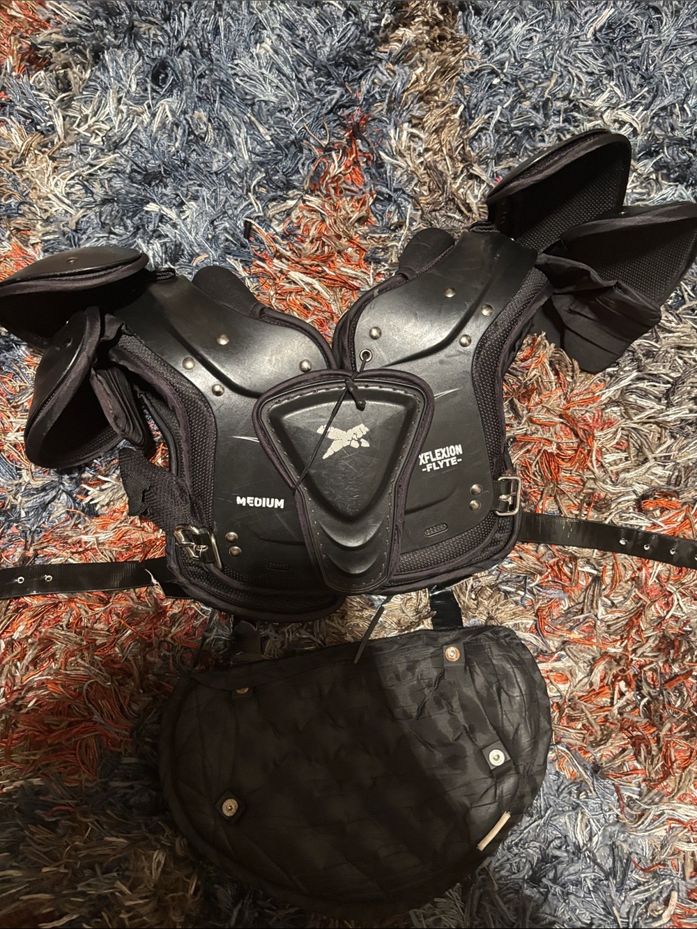 Black XFlexion Flyte Medium Football Shoulder Pads with Removable Belly Pad